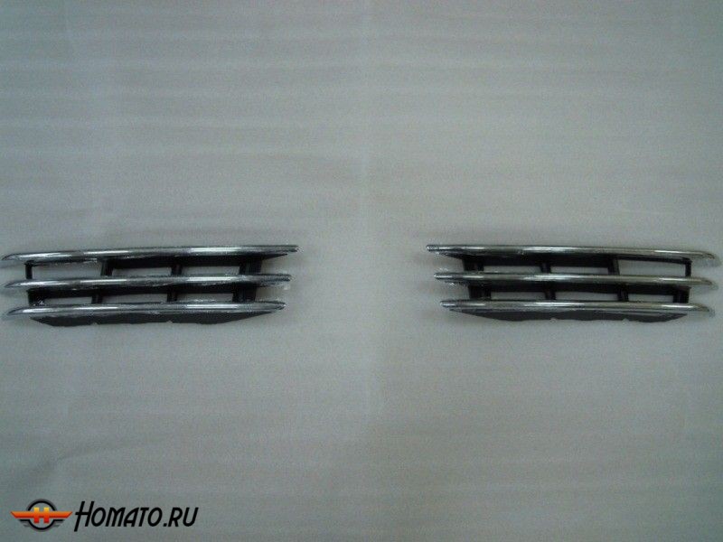 Комплект хромированных вставок в передний бампер для VW Touareg